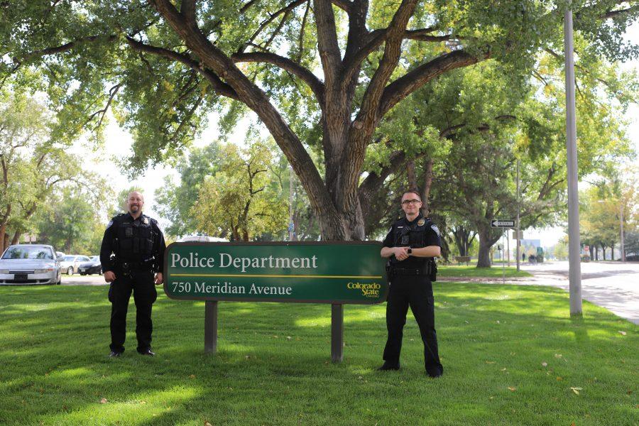 Officer Matt Snyder and Officer Steven Eckelberry stand in front of the Colorado State University Police Department. CSUPD provides services on campus like SafeWalk, bike safety enforcement, and ride along programs. (Brooke Buchan | Collegian) 