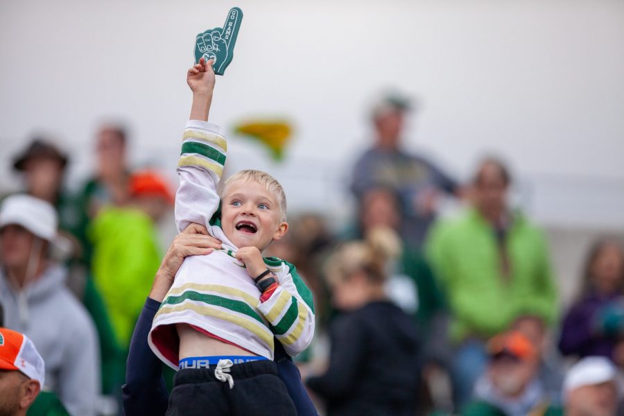 A young fan celebrates during the Homecoming Game against the New Mexico Lobos on Oct. 13. The Rams won 20-18. (Natalie Dyer | Collegian)