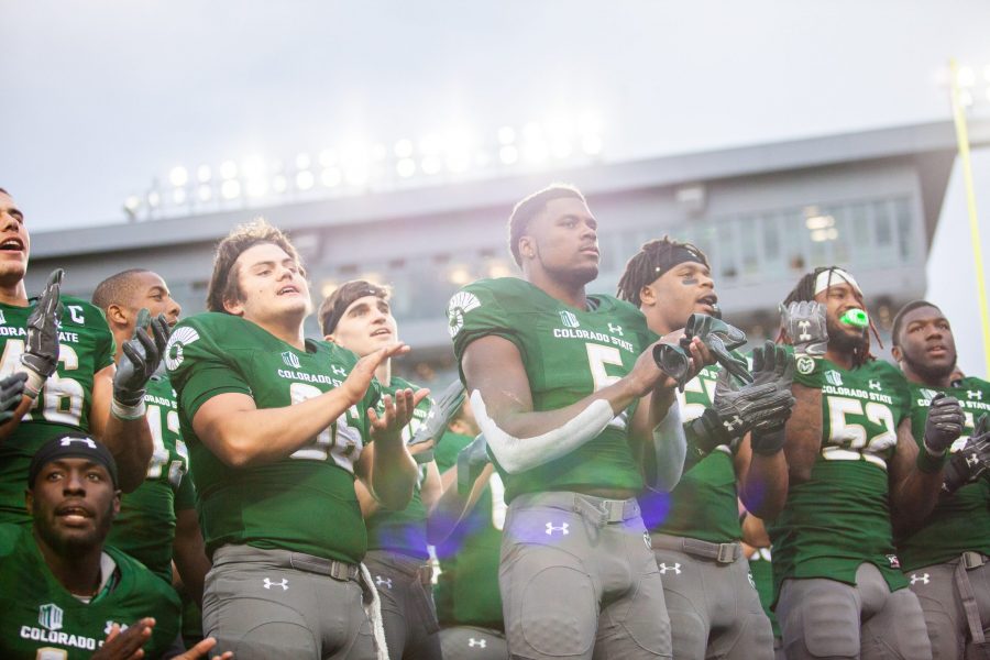 CSU football players celebrate after their victory during the Homecoming Game against the New Mexico Lobos on Oct. 13. The Rams won 20-18. (Natalie Dyer | Collegian)
