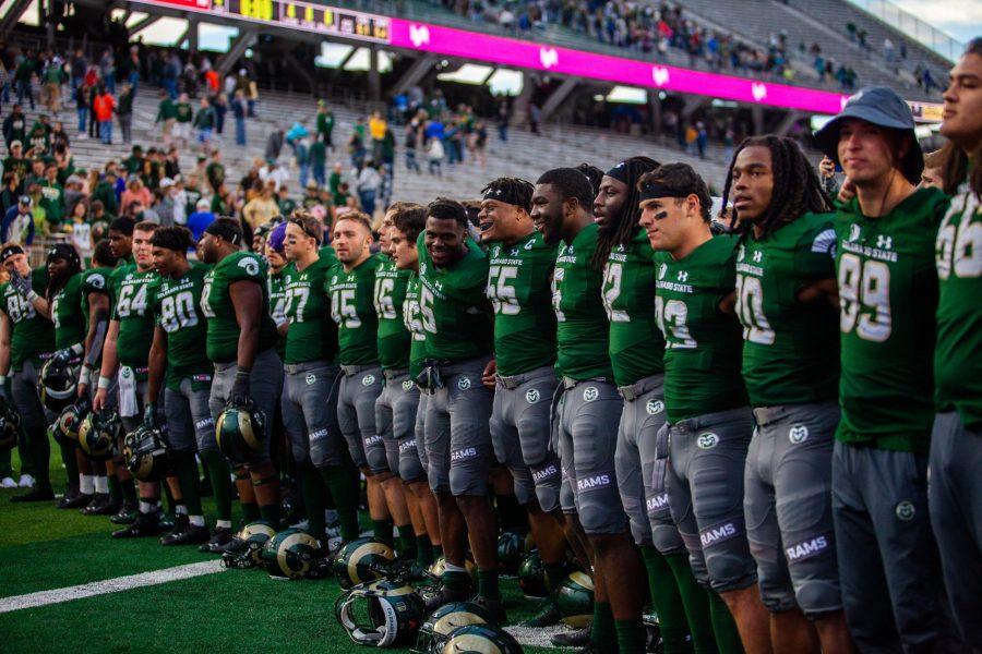 CSU football players celebrate after their victory during the Homecoming Game against the New Mexico Lobos on Oct. 13. The Rams won 20-18. (Natalie Dyer | Collegian)