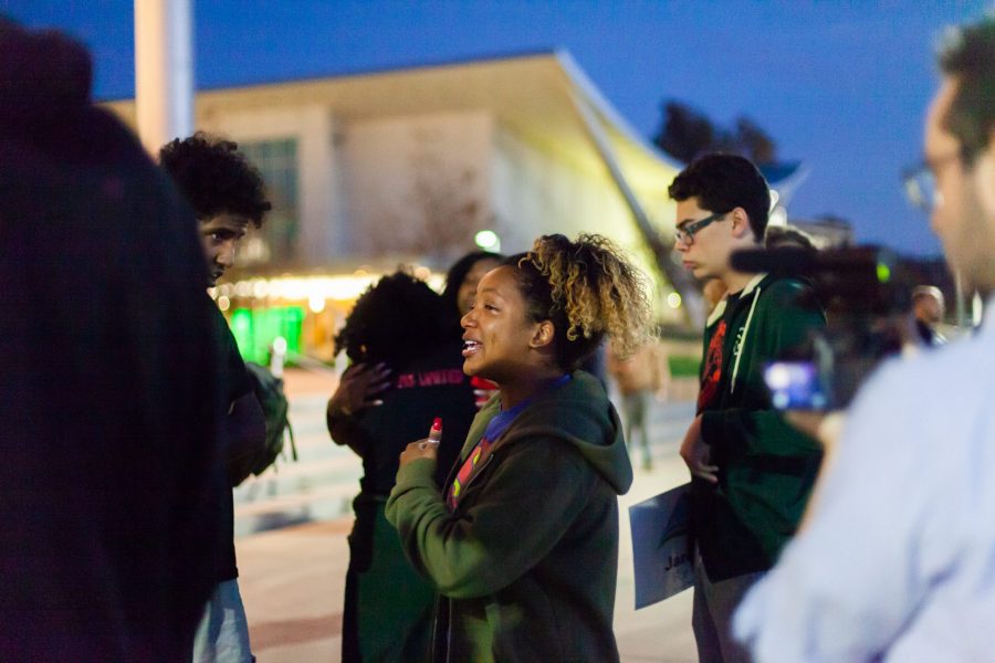 Diamond Nicholson, a sophomore human development and family studies major, talks with other students after racist remarks were directed towards her and other students of color. Nicholson and several other students attended the Colorado Democrat rally held inside the Lory Student Center Wednesday, Oct. 24, 2018. (Natalie Dyer | Collegian)