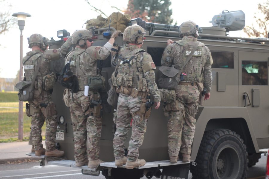 Law enforcement ride on a armored vehicle next to the CSU police station on Oct. 29, 2018, prior to Dennis Pragar speaking in the Lory Student Center. (Wout Bouckaert | CTV)