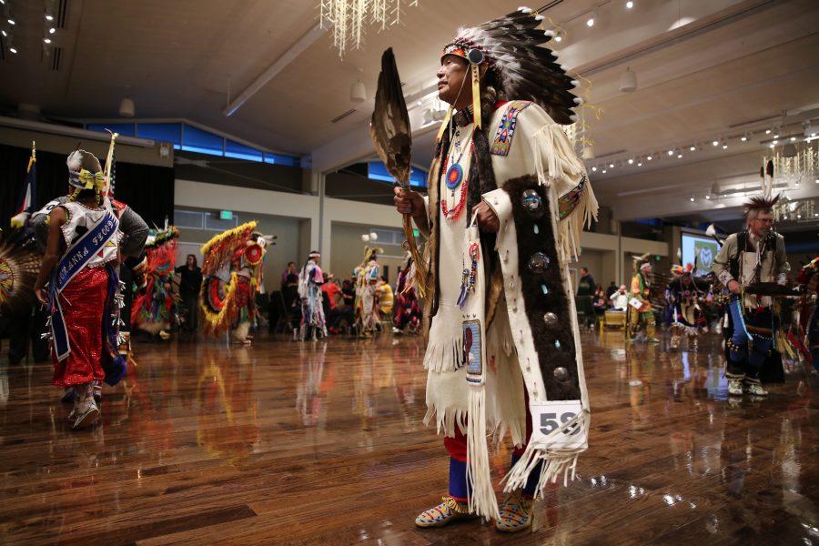 Isaac Wak Wak moves through the grand ballroom as part of the grand entry at the 36th annual AISES Pow Wow at the LSC on Nov. 3, 2018. (Forrest Czarnecki | Collegian)
