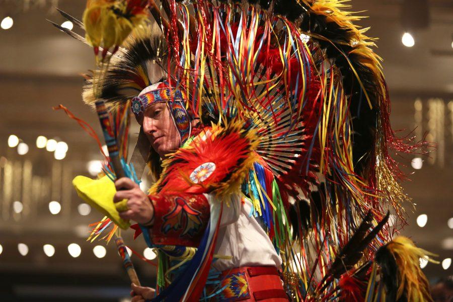 Stanley Aschenbrenner performs a dance called the "Men's Fancy Dance" at the 36th annual AISES Pow Wow at the LSC on Nov. 3, 2018. (Forrest Czarnecki | Collegian)