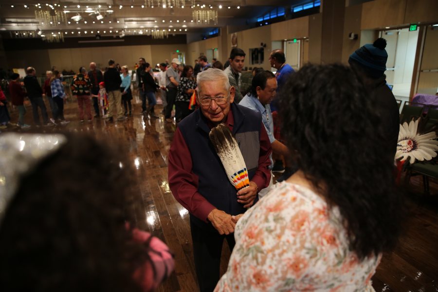 John Emhoolah greets pow wow attendees before the start of the 36th annual AISES Pow Wow at the LSC on Nov. 3, 2018. Emhoolah has been coming to the AESIS Pow Wow "for as long as I can remember, since the very beginning," he said. (Forrest Czarnecki | Collegian)