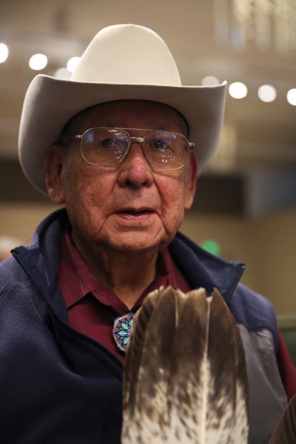 John Emhoolah Jr. watches a gourd dance at the 36th annual AISES Pow Wow at the LSC on Nov. 3, 2018. Emhoolah has been coming to the AESIS Pow Wow "for as long as I can remember, since the very beginning," he said. (Forrest Czarnecki | Collegian)