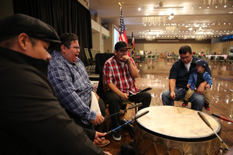 Kendall Kauley, second from left, leads others in singing and drumming during a gourd dance at the 36th annual AISES Pow Wow at the LSC on Nov. 3, 2018. (Forrest Czarnecki | Collegian)