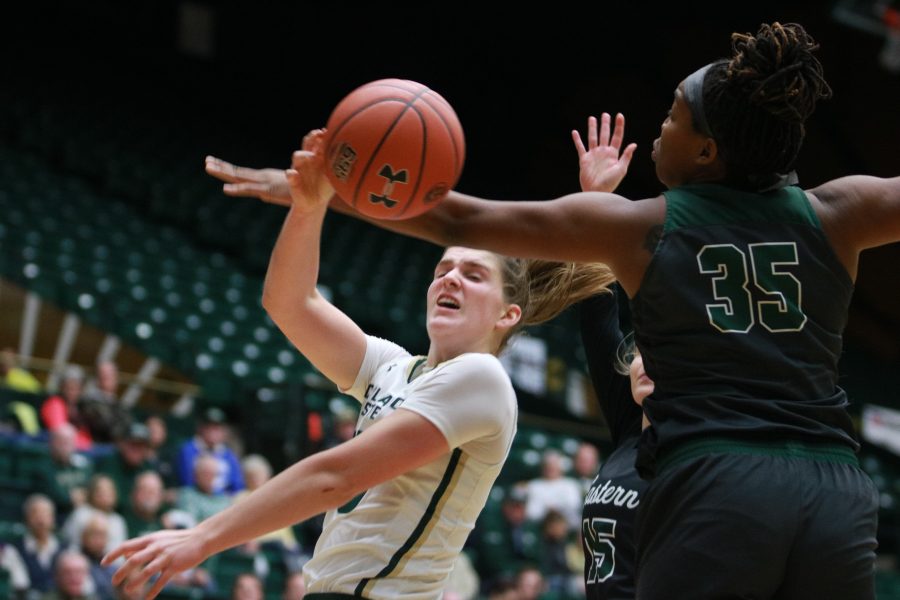 Lore Devos(35) assists a teammate by passing the ball behind her, during CSU's home game vs Eastern NM on November 6th 2018. The Rams win 72-46.(Devin Cornelius | Collegian)