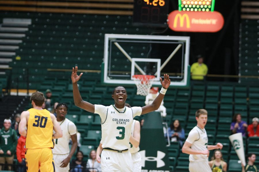 Kendle Moore (3) pumps the crowd up and celebrates after making a big play for CSU. The Rams defeat the Cougars 100-63.(Devin Cornelius | Collegian)