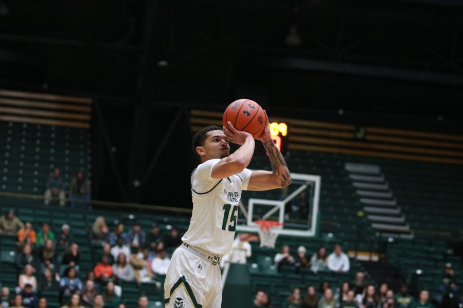 Anthony Masinton-Bonner shoots and scores from three as the Rams beat the Cougars 100-63 (Devin Cornelius | Collegian)