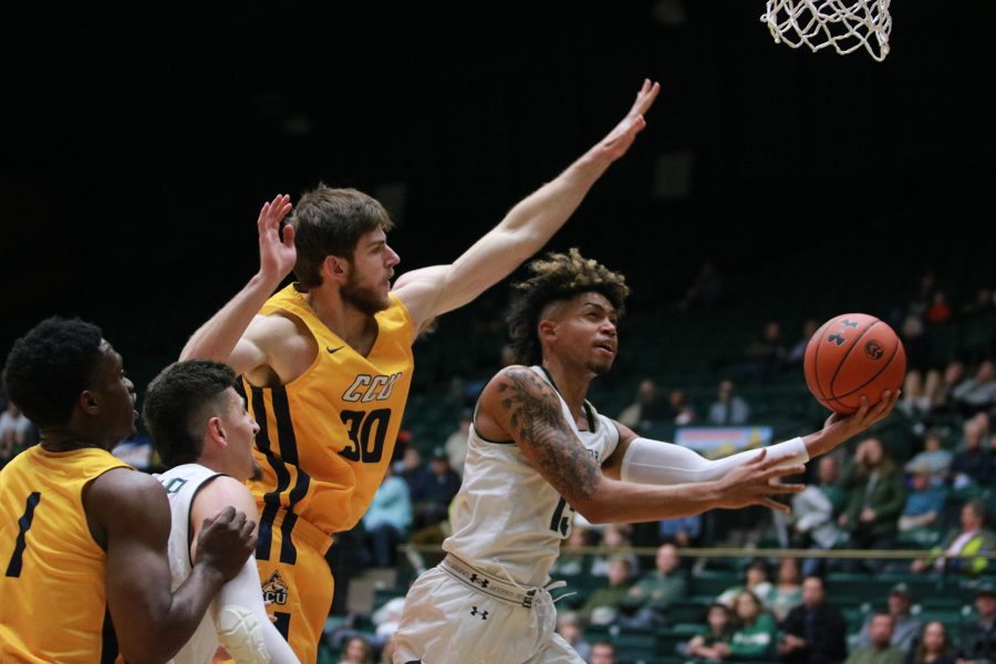 Colorado State University's Lorenzo Jenkins (13) pushes through traffic and shoots during the Rams game against the Colorado Christian University Cougars on Nov. 7, 2018. The Rams won 100-63. (Devin Cornelius | Collegian)