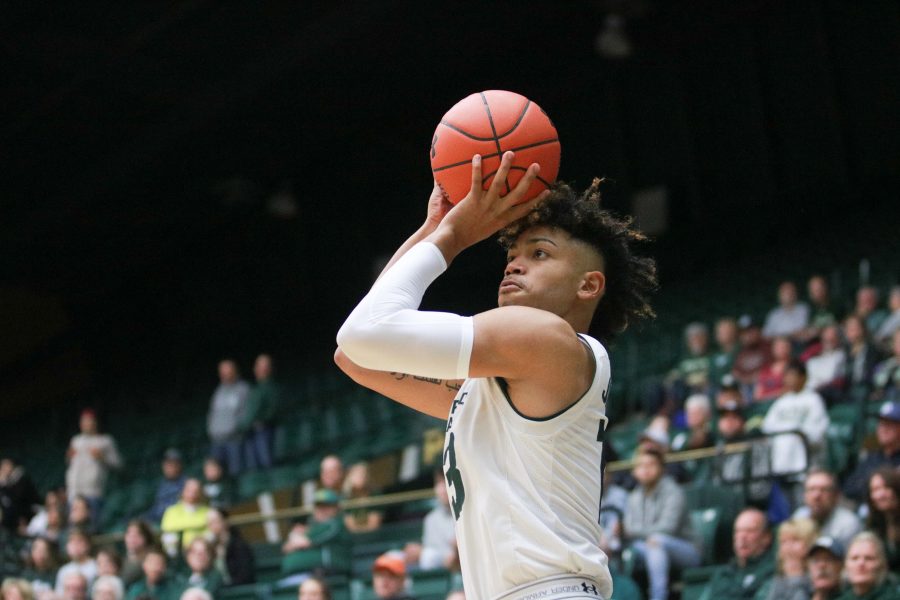 Lorenzo Jenkins(13) shoots from three as the Rams lead the Cougars. The Rams win 100-63 (Devin Cornelius | Collegian)