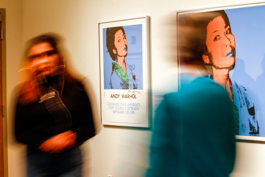 Visitors walk through the one day only Andy Warhol exhibition at the Gregory Allicar Museum of Art Nov. 10. The exhibit featured Warhol pieces from the museums archives as well as Warhol themed photo booths and crafts and a documentary about Warhols time as a visiting artist at CSU in the 1980s. (Ashley Potts | Collegian)