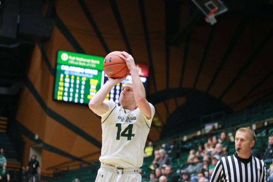 Robbie Berwick (14) pulls up and shoots during the Rams game against the UAPB Golden Lions. The Rams win 92-67.(Devin Cornelius | Collegian)
