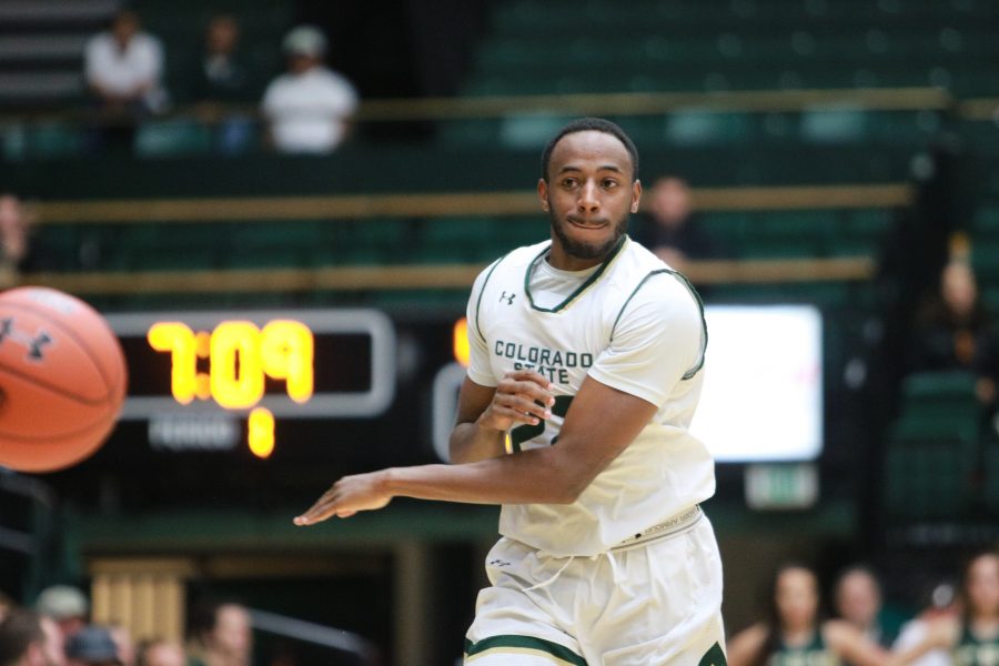 J.D. Paige (22) passes the ball to a teammate as the Rams battle the Golden Lions on Nov 10. The Rams win 92-67 (Devin Cornelius | Collegian)