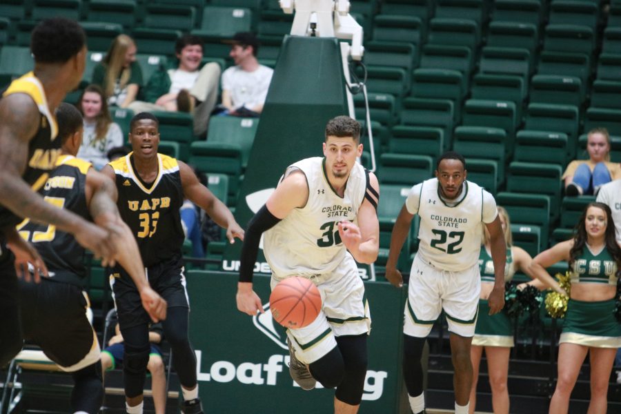 Nico Carvacho (32) sprints to get the rebound for CSU. The Rams defeat the Golden Lions 92-67.  (Devin Cornelius | Collegian)