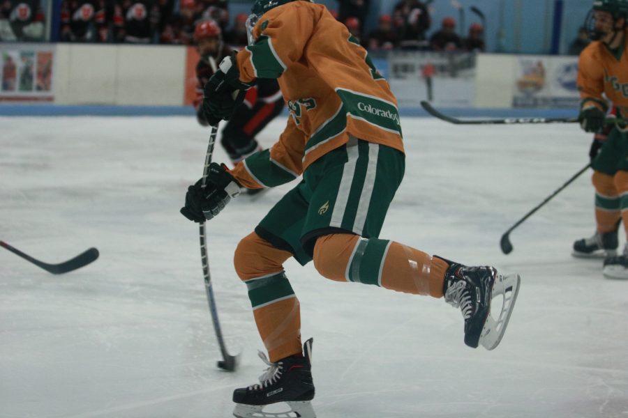 John Tower (7) fires the puck towards the Utah's goal. Rams beat the Utes 6-3.(Devin Cornelius | Collegian)