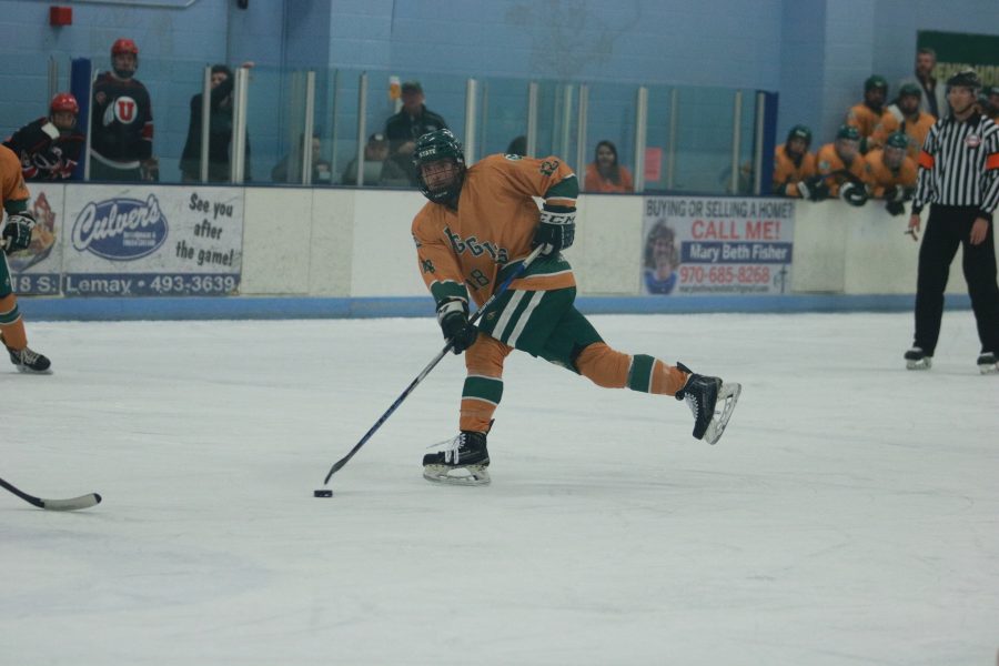 Austin Ansay (18) looks to pass to a teammate as the Rams battle the Utes. The Rams win 6-3. (Devin Cornelius | Collegian)