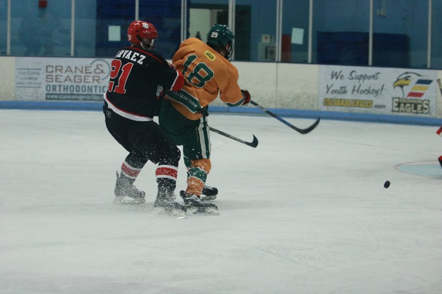 Austin Ansay (18) shoots towards the Utah goalie as the Rams fight against the Utes. The Rams win 6-3 (Devin Cornelius | Collegian)