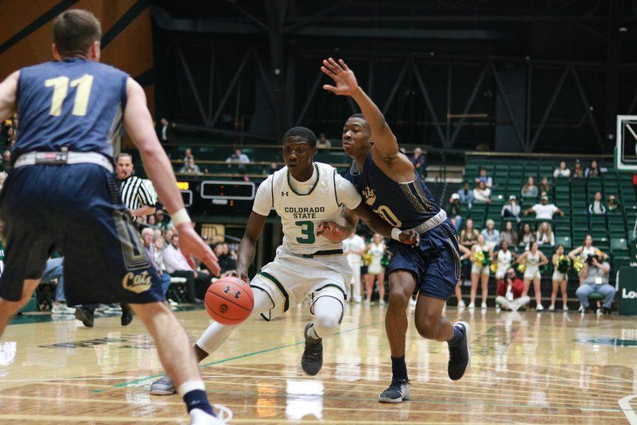 Kendle Moore (3) drives towards the basket as the rams battle the bobcats. CSU beats MSU 81-77. (Devin Cornelius | Collegian)