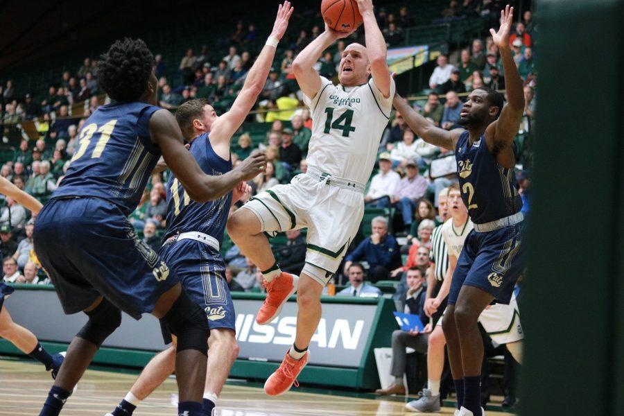 Robbie Berwick (14) spins and shoots from three to tie the game. CSU defeats MSU 81-77 (Devin Cornelius | Collegian)