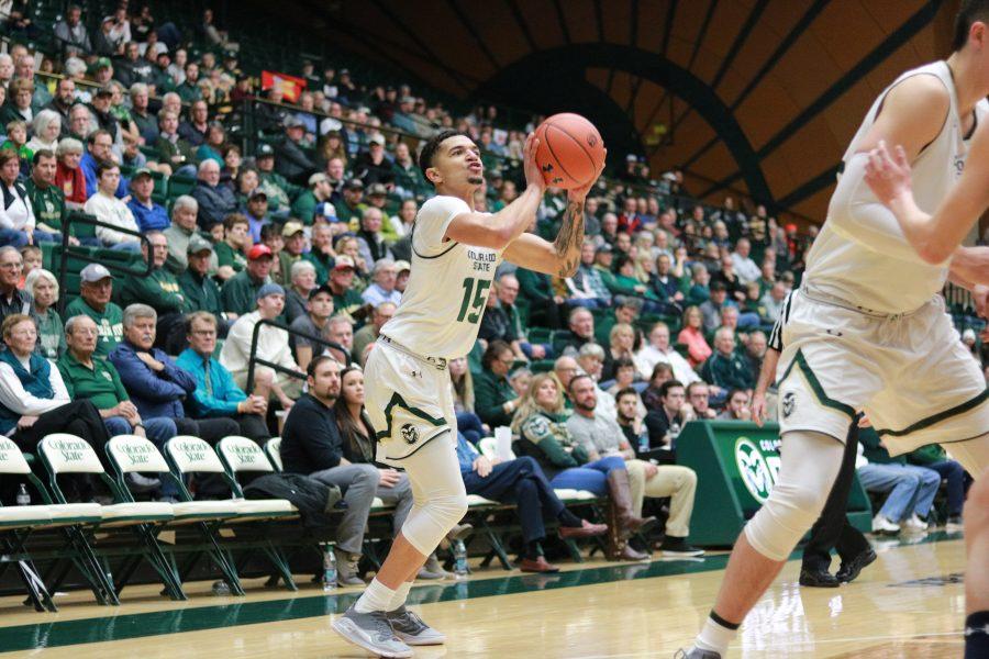 Anthony Masinton-Bonner (15) shoots from three as CSU battles against MSU. The rams beat the bobcats 81-77(Devin Cornelius | Collegian)