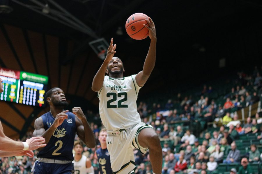 J.D. Paige (22) smiles as he  jumps up for a layup as CSU takes on MSU at home. CSU wins 81-77. (Devin Cornelius | Collegian)