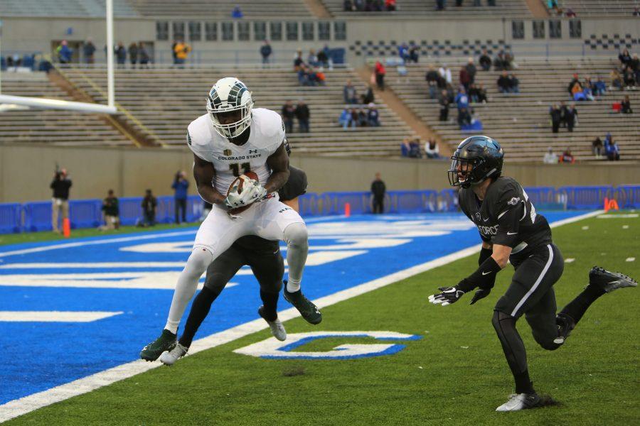 Colorado State wide receiver Preston Williams (11) fights off Air Force defenders to make the catch from quarterback Collin Hill on his way to a touchdown against Air Force, Nov. 22nd. (Davis Bonner | Collegian)