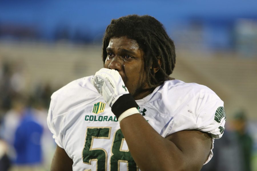 Colorado State offensive lineman T.J. Roundtree reacts to the Rams 27-19 loss against Air Force on his way off the field, Nov. 22nd, 2018. (Davis Bonner | Collegian)