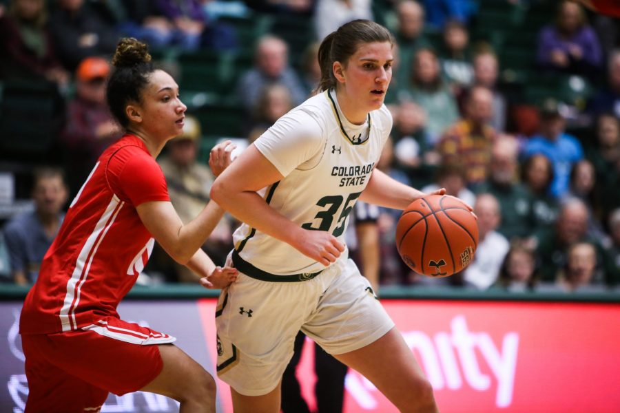 Lore Devos (#35) attempts to drive forward the ball during the game on Nov. 25. (Tony Villalobos May | Collegian)