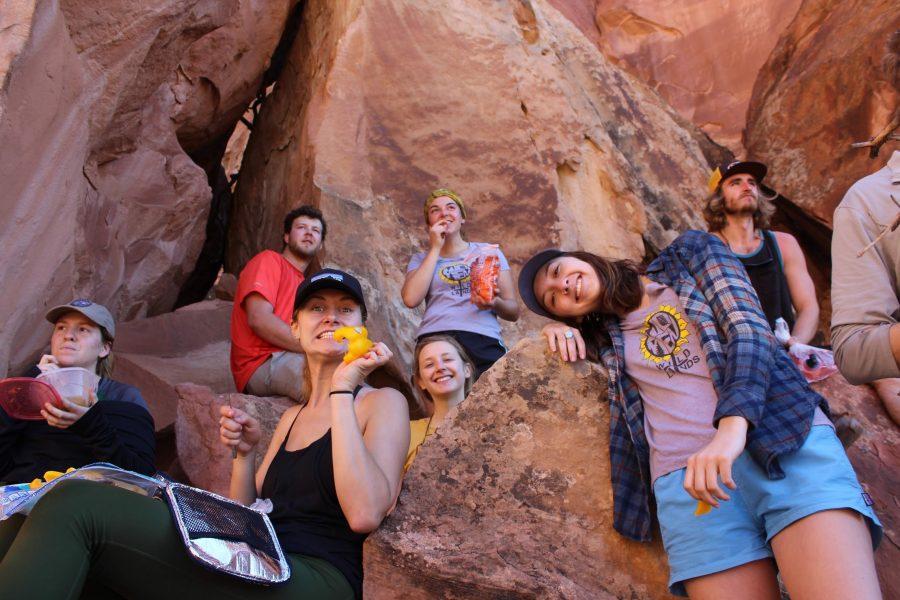 Women for Wild Lands’ members enjoy a snack mid-hike. (Courtesy of Caitlin Cunningham.)