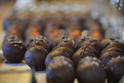 arrangement of Nuance Chocolate's round chocolate truffles in orderly rows