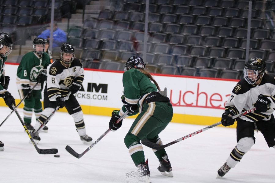 Alyssa Schmidt (7) looks to shoot as the Rams take on the Buffs at the Pepsi Center. Rams lose 9-0. (Devin Cornelius | Collegian)