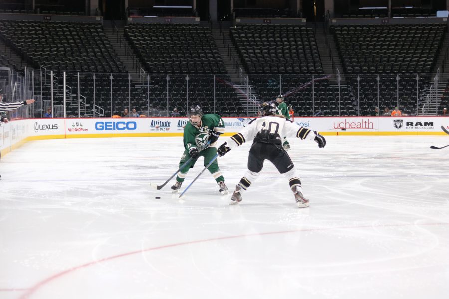 Kristen Perry (14) looks for an opening to shoot as the Rams battle the Buffs at the Pepsi Center. The Rams lose 9-0. (Devin Cornelius | Collegian)