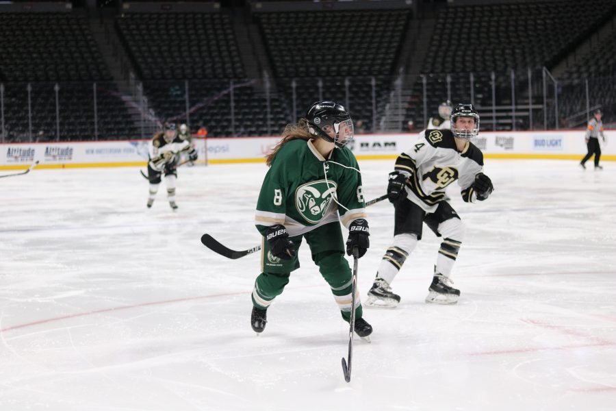 Megan Johnston (8) watches the puck fly by as the Rams battle the Buffs. The Rams lose 9-0. (Devin Cornelius | Collegian)