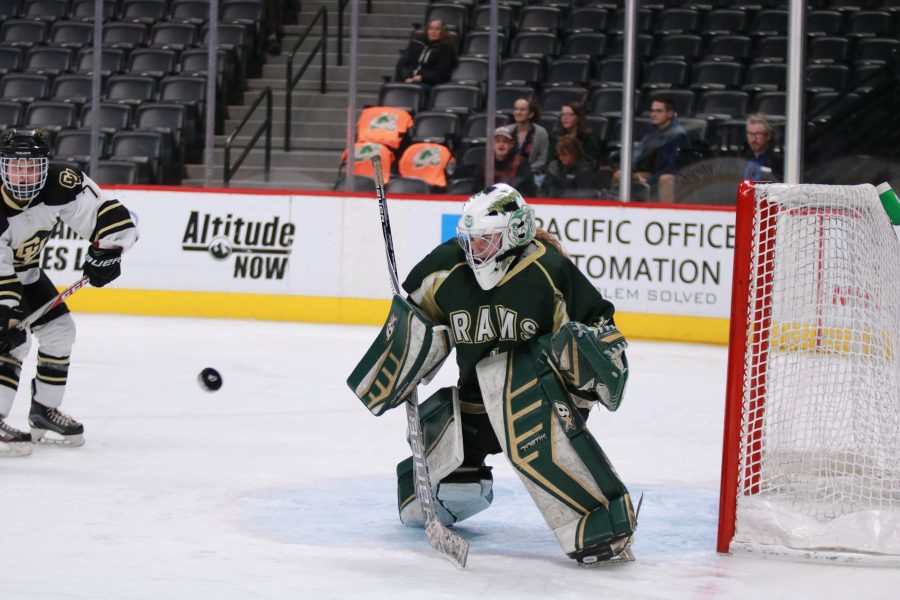 Makenzie Roberts (1) deflects the puck away from the goal, as the Lady Rams battle the Lady Buffs. Rams lose 9-0. (Devin Cornelius | Collegian)