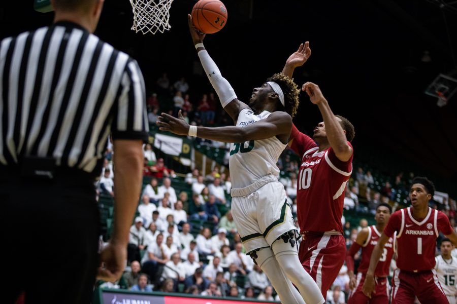 Kris Martin from CSU makes a layup in the second half of the game against the Arizona Razorbacks on December 5, 2018. He had a total of 7 points during the game, spending more time on the court than any other CSU player with 35 total minutes. (Josh Schroeder | Collegian)