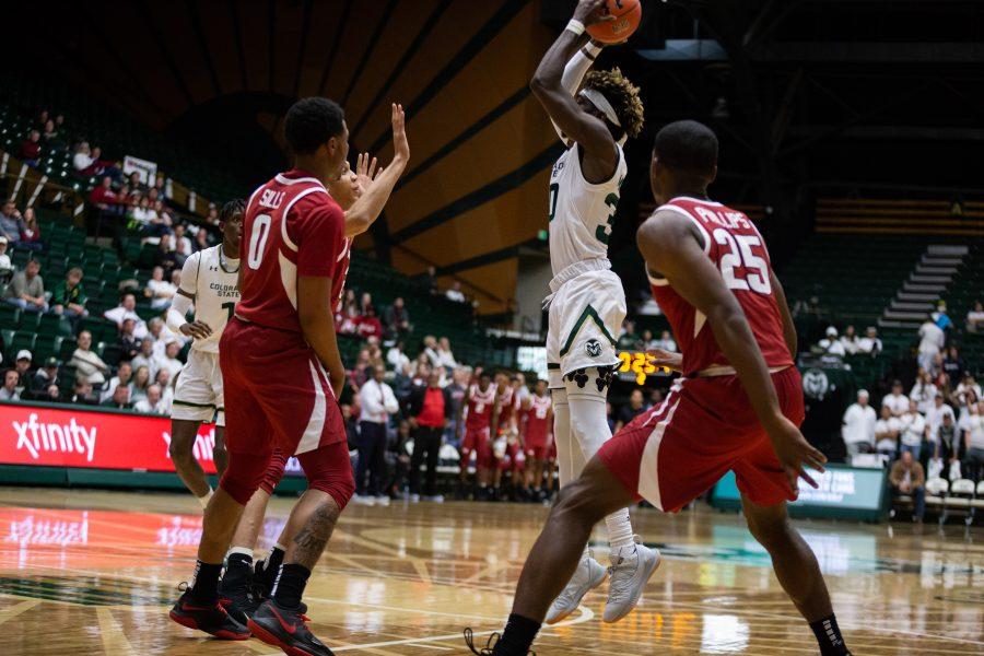 Kris Martin (30) shoots from just outside the key at the end of the game against the Arkansas Razorbacks on Wednesday, December 5, 2018. The Razorbacks scored the first points of the game and CSU never took the lead, ending the game 74-98. (Collegian File Photo)