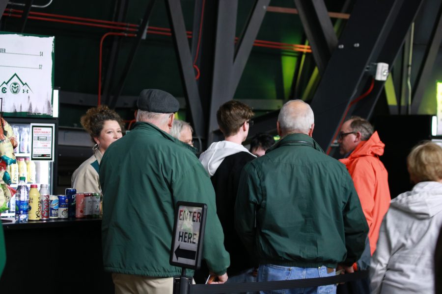 CSU fans line up to purchace drinks at the new Moby arena porch. (Devin Cornelius | Collegian)