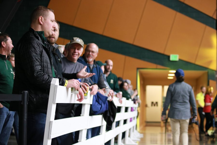 Fans watch the CSU basketball while drinking beer at the new CSU party porch in Moby arena. (Devin Cornelius | Collegian)
