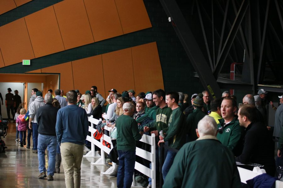 Fans gather at the new Moby Arena porch to buy alcoholic beverages and watch CSU basketball. (Devin Cornelius | Collegian)