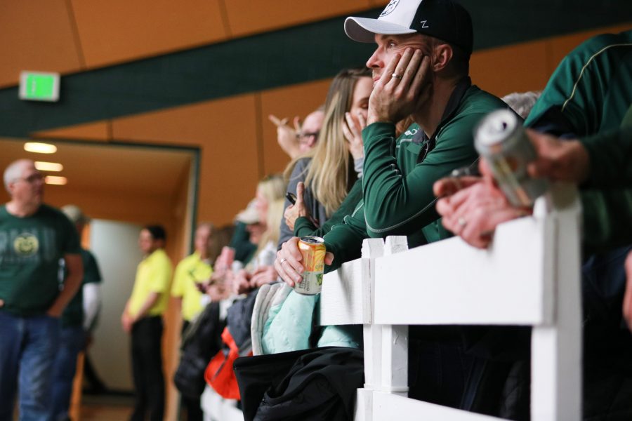Fans watch the CSU basketball while drinking beer at the new CSU party porch in Moby arena. (Devin Cornelius | Collegian)