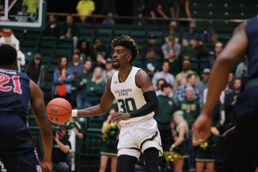 Kris Martin (30) looks for an open teammate during CSU's home game against FSU. The Rams defeat the Bulldogs 75-64. (Devin Cornelius | Collegian)