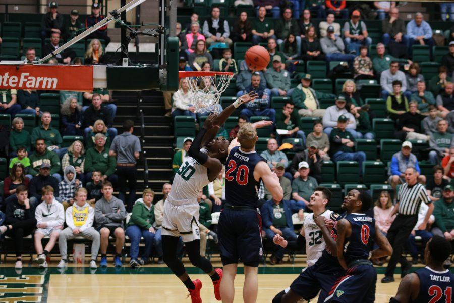 Kris Martin (30) drives to the basket and shoots a layup, as CSU battles FSU at Home. The Rams beat the Bulldogs 74-65. (Devin Cornelius | Collegian)