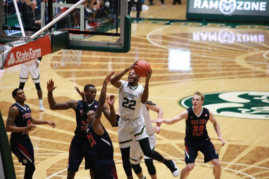 J.D Paige (22) shoots a layup during the Rams game vs the Bulldogs. CSU wins 75-64. (Devin Cornelius | Collegian)