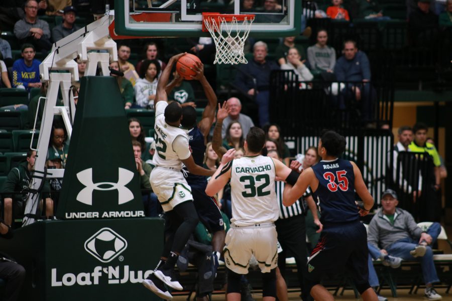 J.D Paige (22) blocks a FSU players shot during the CSU game at Home. The Rams win 75-64. (Devin Cornelius | Collegian)