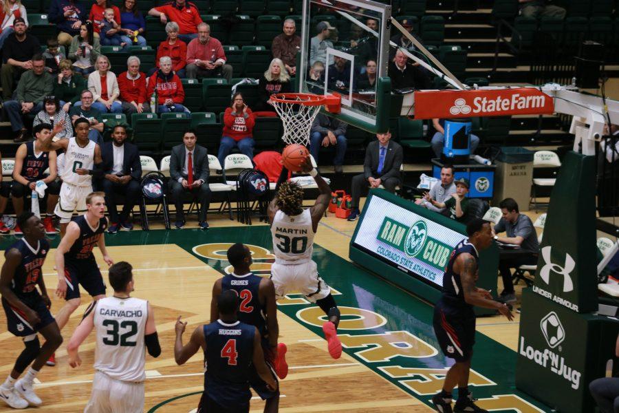 Kris Martin (30) goes up for a dunk during CSU's home game against FSU. The Rams win 75-64. (Devin Cornelius | Collegian)