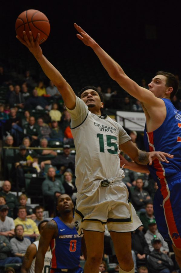 Colorado State University's Anthony Masinton-Bonner (15) goes in for a layup against Boise State on Jan. 29. The Rams fell to the Broncos 70-68. (Skyler Pradhan | Collegian)