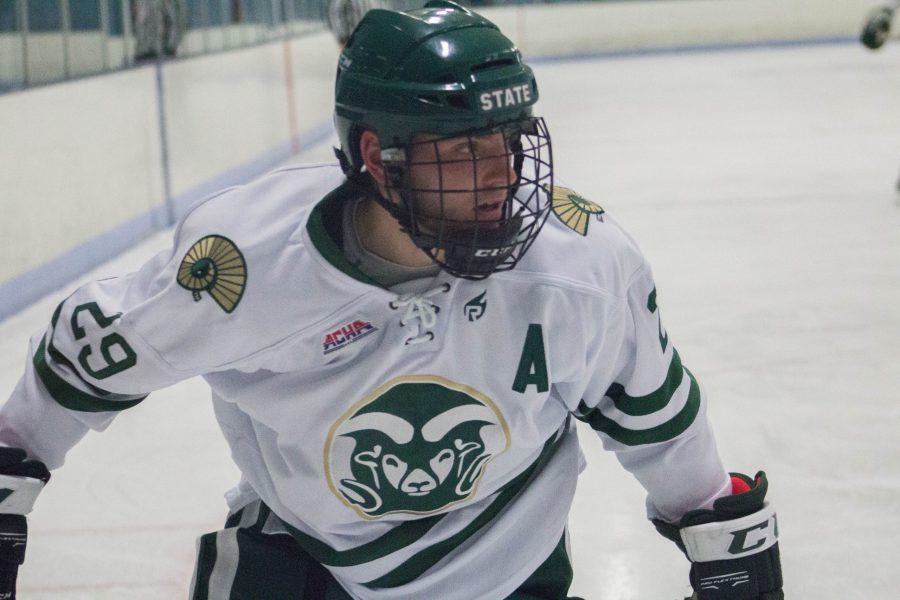 Austin Ansay skates after a loose puck during the game against Minot State Oct. 26, 2017. (Ashley Potts | Collegian)