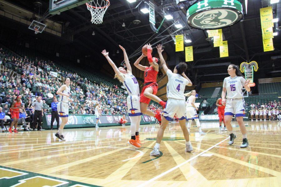 Redshirt Senior, Hannah Tvrdy and Redshirt Freshman, Jordyn Edwards try and stop opposing team from getting a layup during the CSU vs. UNM  Basketball game on Jan 27. (Joshua Contreras | Collegian)
